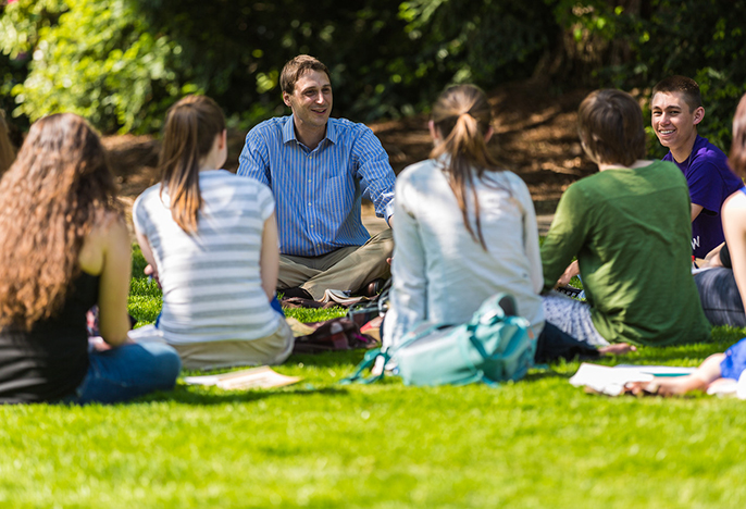 Classroom taking place outside on a sunny day